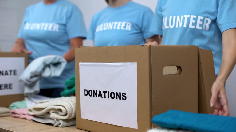 Volunteers organizing clothing donations